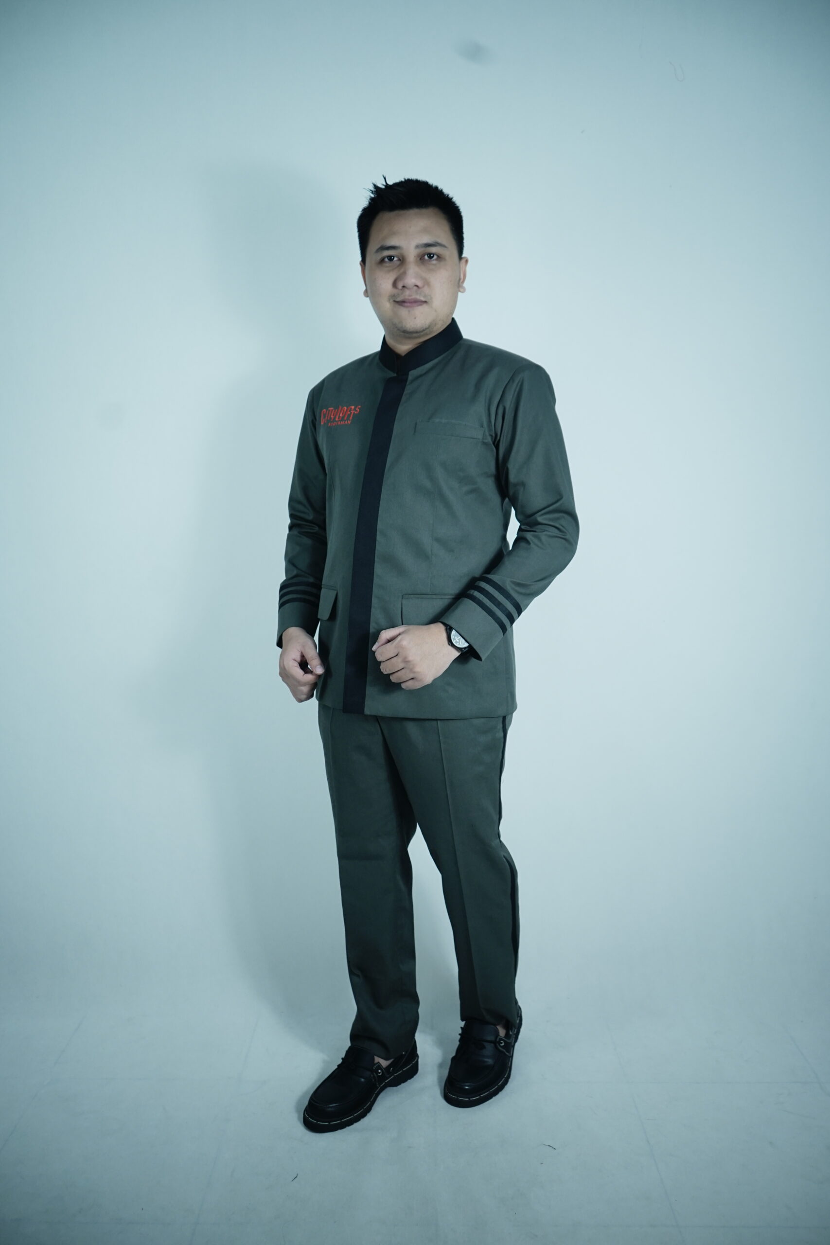 Kemeja Doorman Citylofts Sudirman